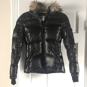 SAM down jacket with fur trimmed collar.